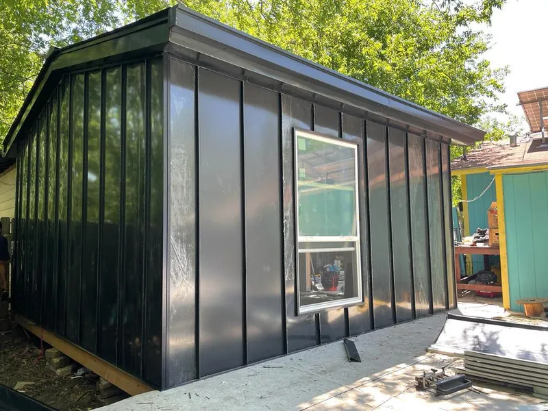 Black standing seam metal wall panels for Metal Roof Installation in Huntsville