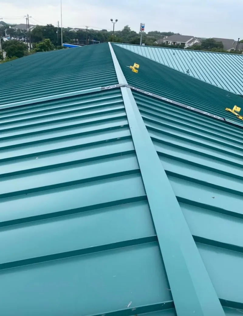 Green commercial metal roof ridge and valley for Metal Roof Repair in Huntsville