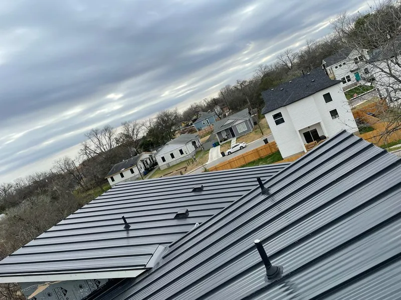 Standing seam metal roof panels with vents for Skylight Repair in Huntsville